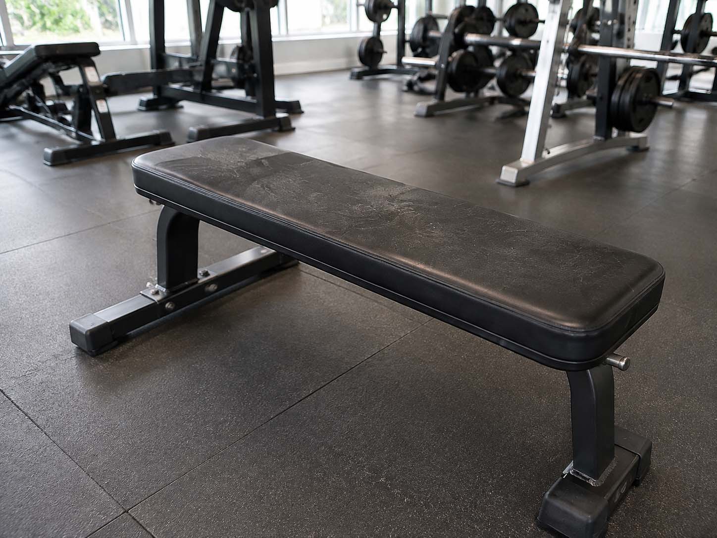 Dirty gym bench before steam cleaning